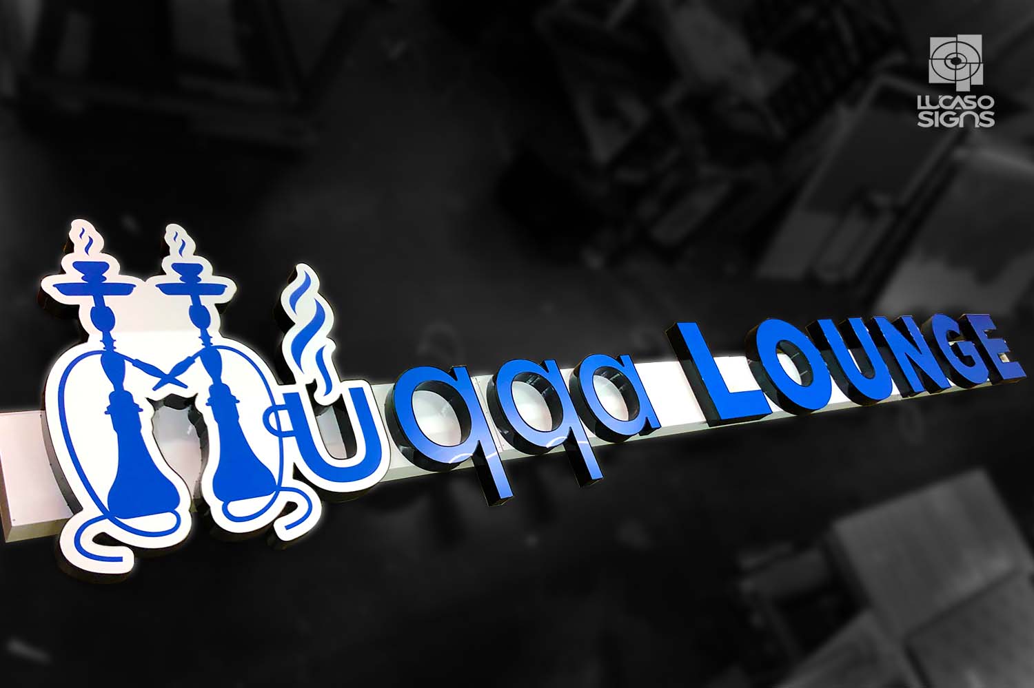 Channel letters dual color blue on day white at night on raceways by lucaso signs