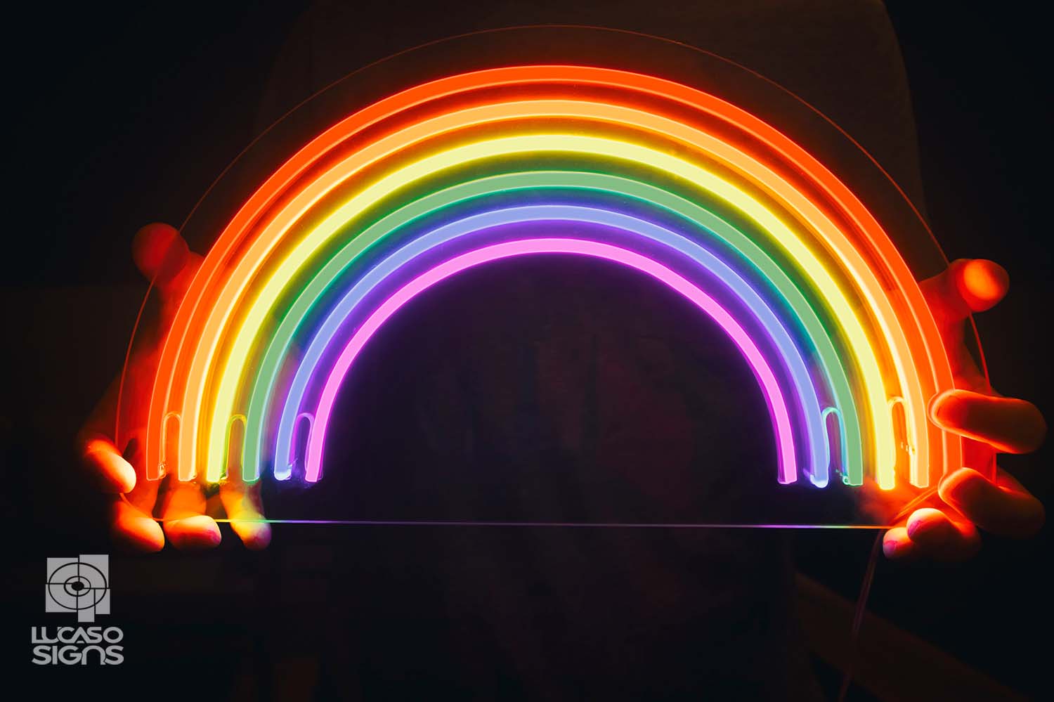 Colorful rainbow neon flex LED sign glowing in the dark by Lucaso Signs