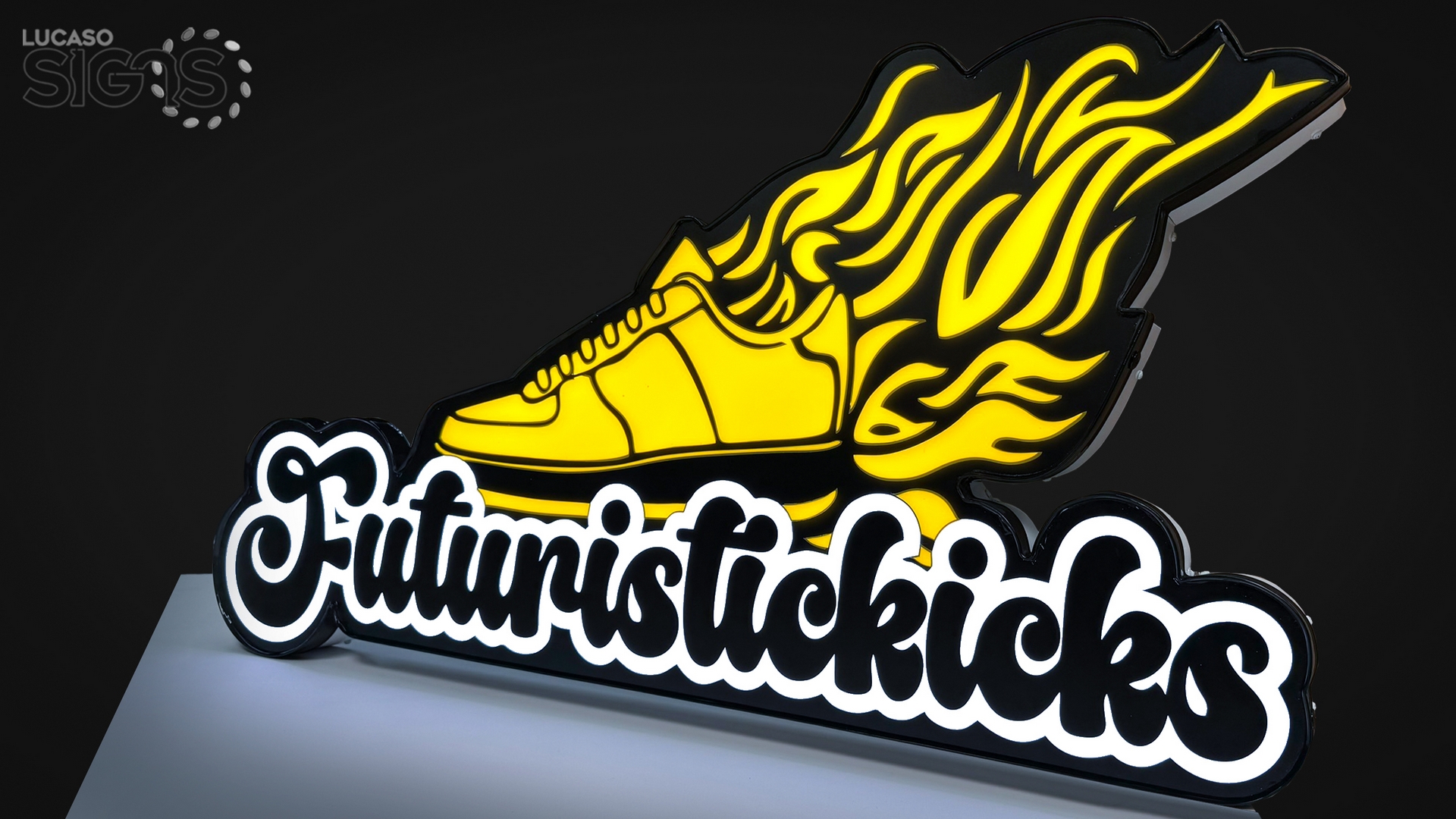 Custom illuminated logo sign shaped like a flaming sneaker for Futuristickicks by Lucaso Signs