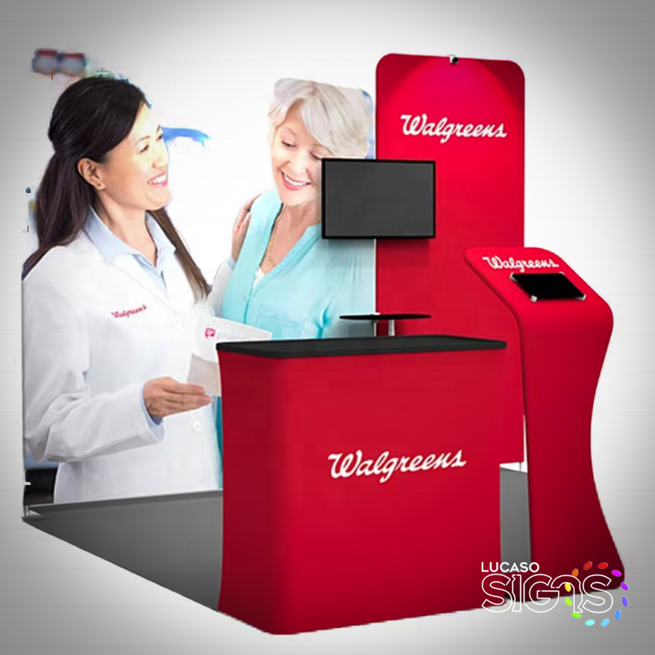 10x10 Walgreens trade show booth with branded counters, display stand, and printed backdrop by Lucaso Signs