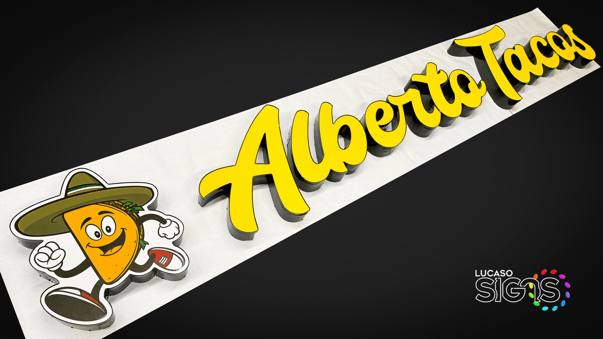 Script channel letters with logo by lucaso signs